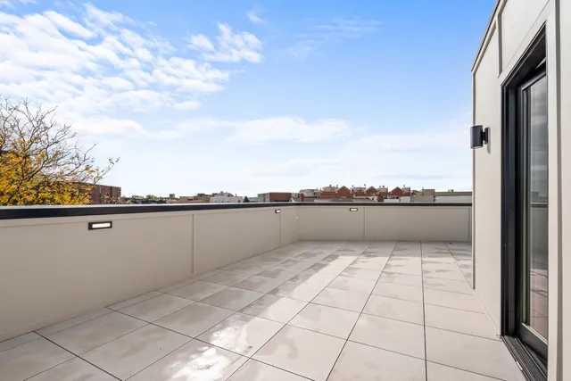 a black and white photo of a living room