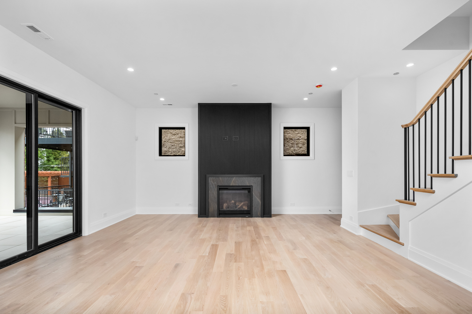 2832 North Racine Avenue, Unit 2W Chicago, IL 60657 - Photo 5 of 31 a view of empty room with wooden floor and entryway