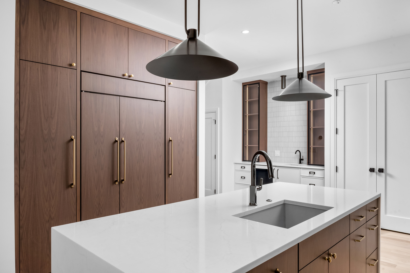2832 North Racine Avenue, Unit 2W Chicago, IL 60657 - Photo 10 of 31 a kitchen with a sink and a refrigerator