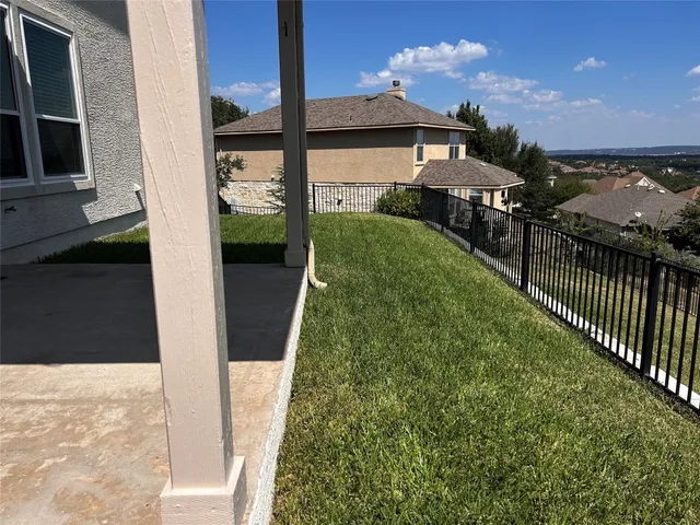 a view of a porch with a yard