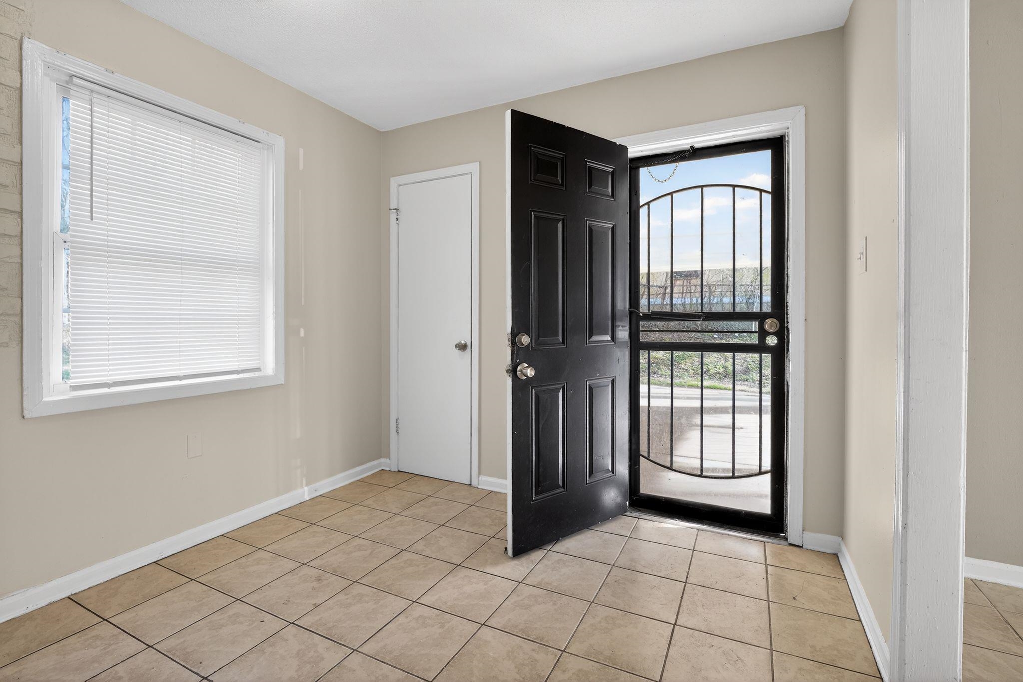 4306 University Street Memphis, TN 38127 - Photo 4 of 26 Entryway featuring light tile patterned flooring