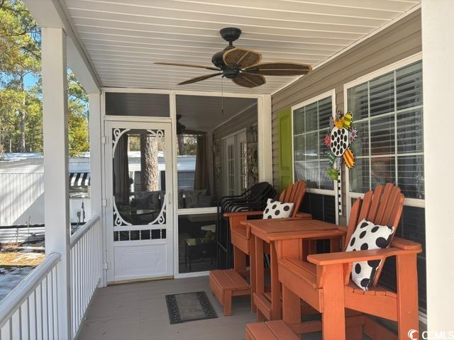 449 East Bank Dr Garden Murrells Inlet, SC 29576 - Photo 8 of 31 Exterior space with covered porch and ceiling fan