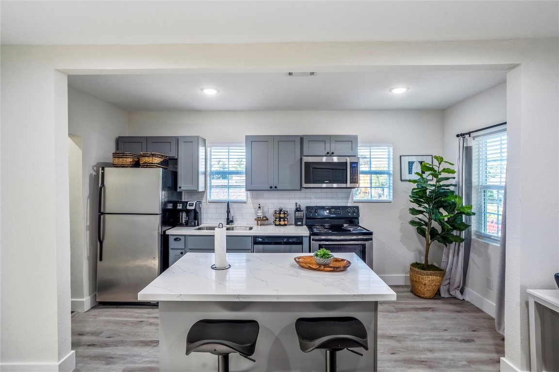 5 Estelle Street, Unit 1 Houston, TX 77003 - Photo 26 of 33 a kitchen with sink and refrigerator