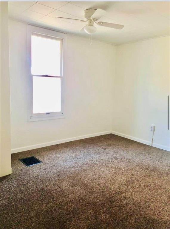 269 Pershing Avenue Leechburg, PA 15656 - Photo 6 of 11 an empty room with a window