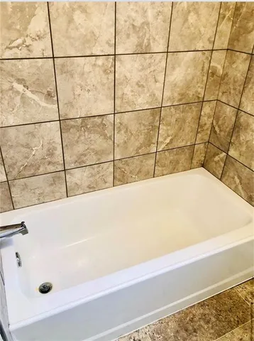 a bathroom with a bathtub