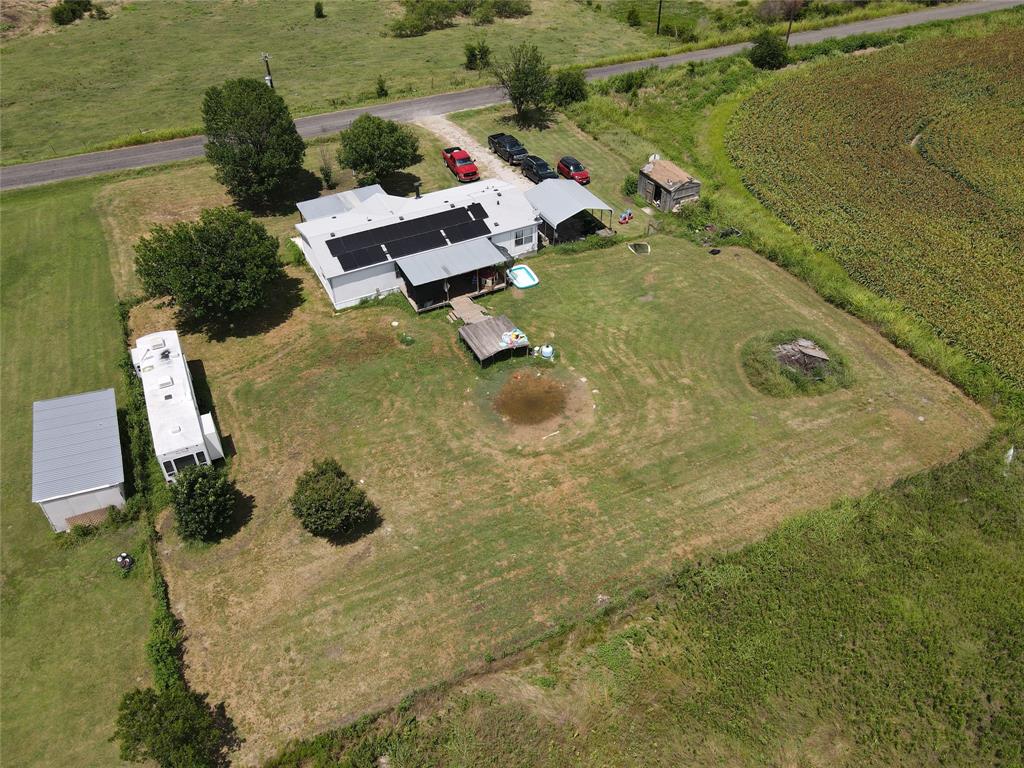 15962 Fritcher Road Pilot Point, TX 76258 - Photo 9 of 24 Aerial view of property and surrounding area featuring rural landscape