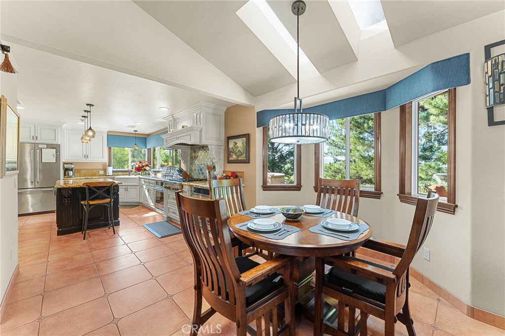 1632 Country Club Drive Redlands, CA 92373 - Photo 12 of 54 a view of a dining room with furniture window and outside view