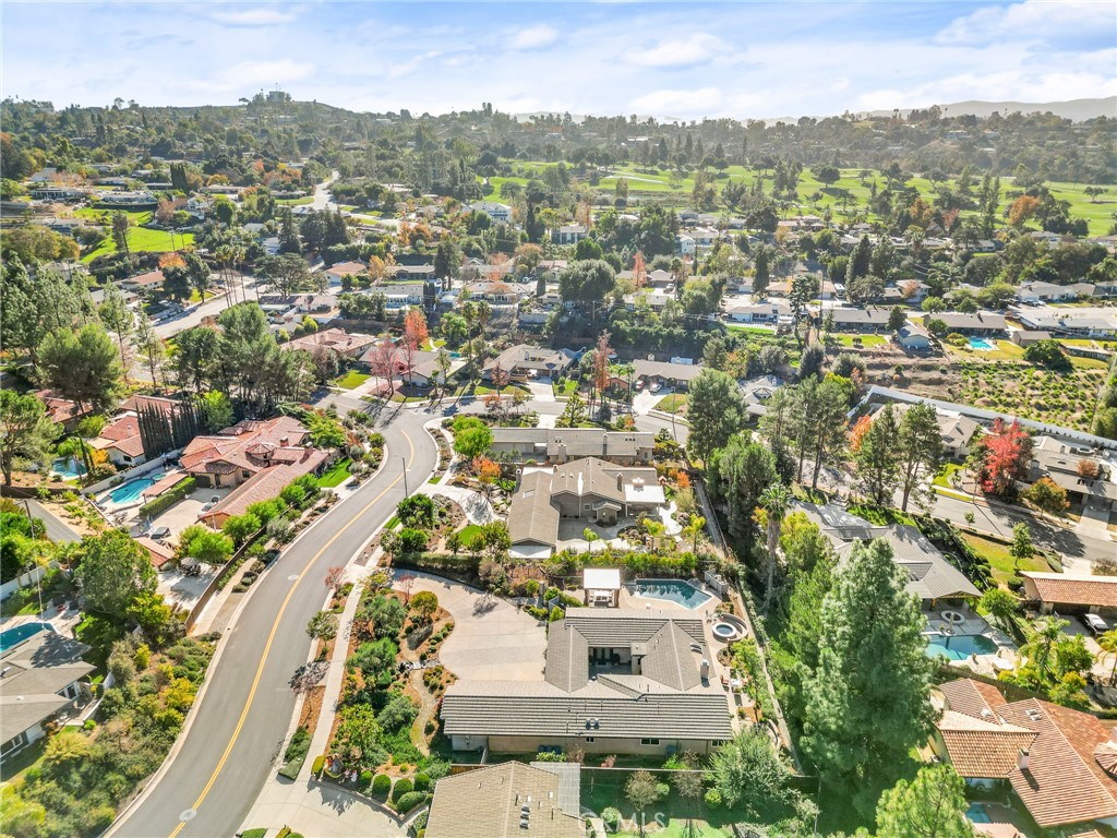 1632 Country Club Drive Redlands, CA 92373 - Photo 35 of 54 an aerial view of residential building with parking
