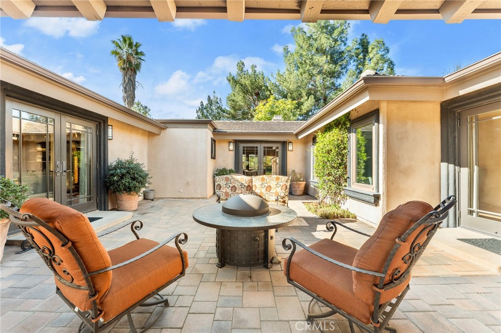 1632 Country Club Drive Redlands, CA 92373 - Photo 49 of 54 a outdoor living space with furniture potted plant and a potted plant