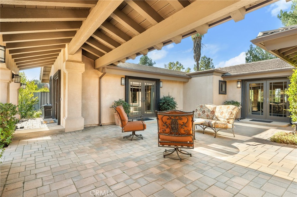 1632 Country Club Drive Redlands, CA 92373 - Photo 50 of 54 a outdoor space with patio furniture and a potted plant