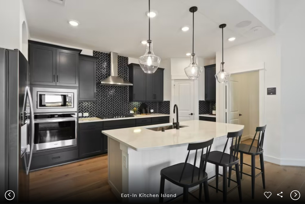 2913 Zuni Path Leander, TX 78641 - Photo 8 of 17 a kitchen with a table and chairs
