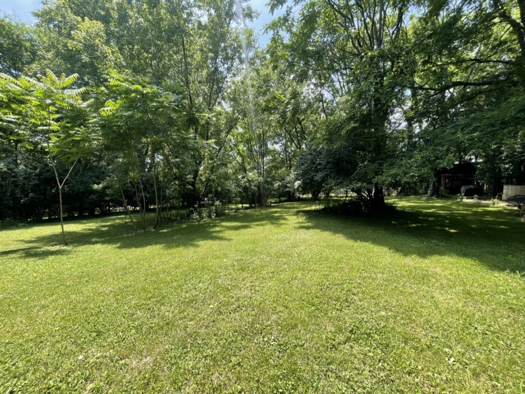 1521 Riverside Drive Nashville, TN 37206 - Photo 2 of 3 a view of a swimming pool with a big yard