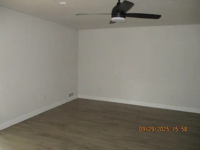 a view of small space with wooden floor