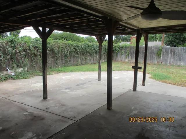 a view of yard with porch