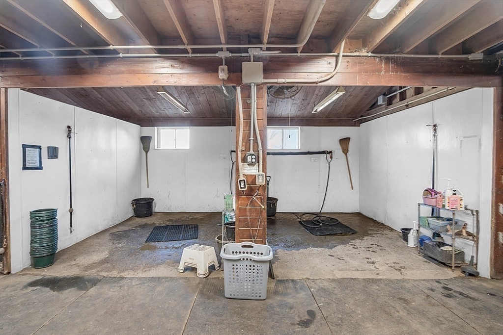 84 Powers Road Westford, MA 01886 - Photo 19 of 42 a view of a room with gym equipment