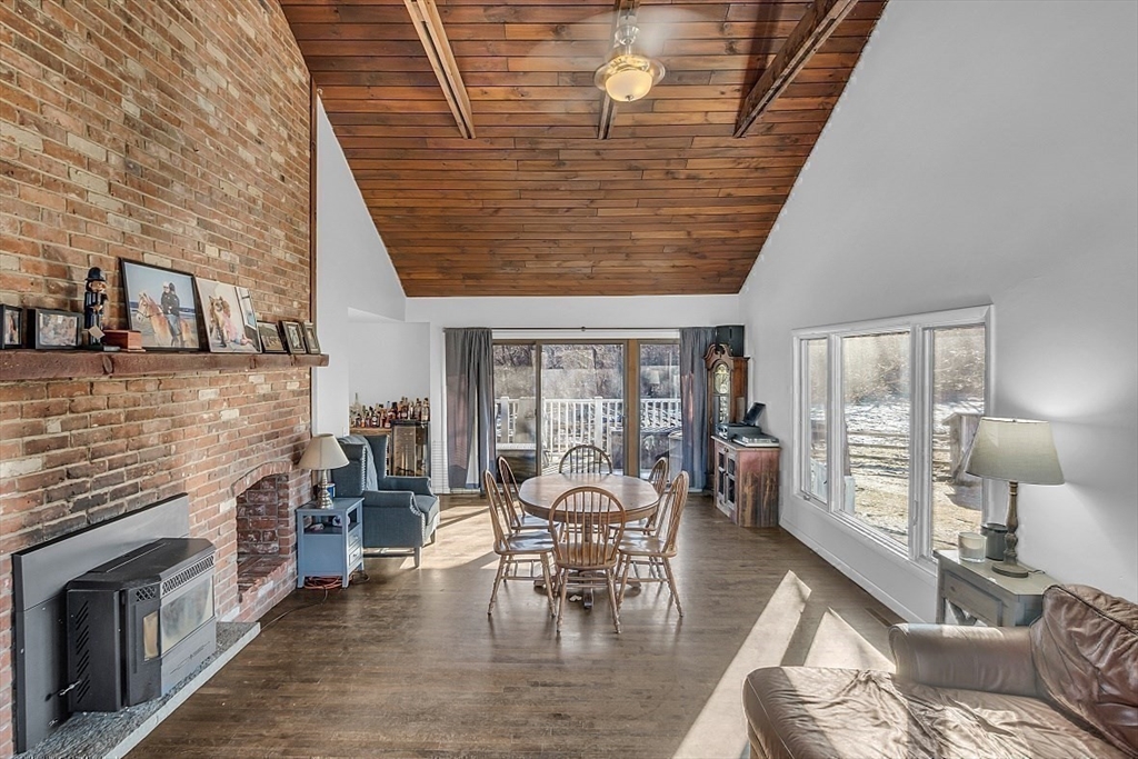 84 Powers Road Westford, MA 01886 - Photo 37 of 42 a view of a dining room with furniture window and outside view