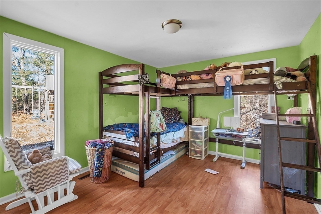 84 Powers Road Westford, MA 01886 - Photo 40 of 42 a bedroom with 2 bed and a window