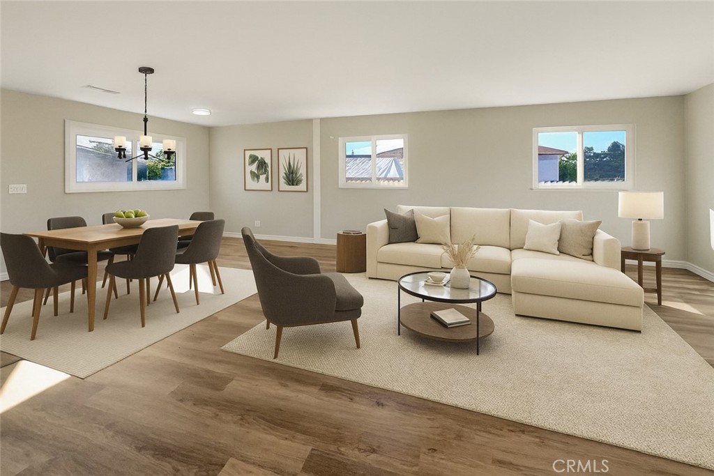 380 Harvard Street Oxnard, CA 93036 - Photo 1 of 14 a living room with furniture a dining table and a window