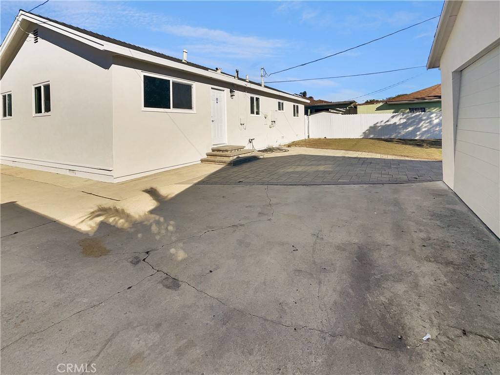 380 Harvard Street Oxnard, CA 93036 - Photo 14 of 14 a view of a big house with wooden fence
