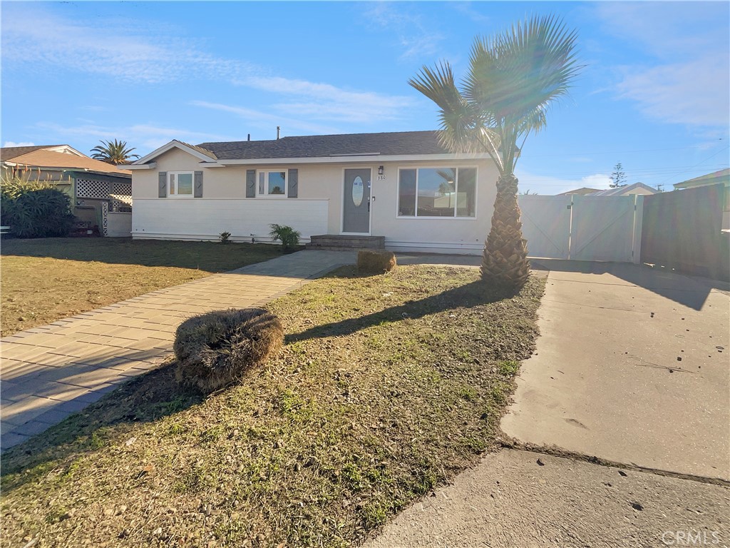 380 Harvard Street Oxnard, CA 93036 - Photo 5 of 14 a view of a house with a yard
