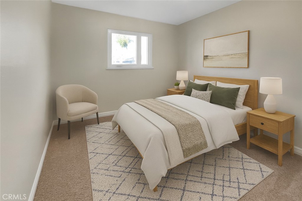 380 Harvard Street Oxnard, CA 93036 - Photo 8 of 14 a bedroom with a bed and chair