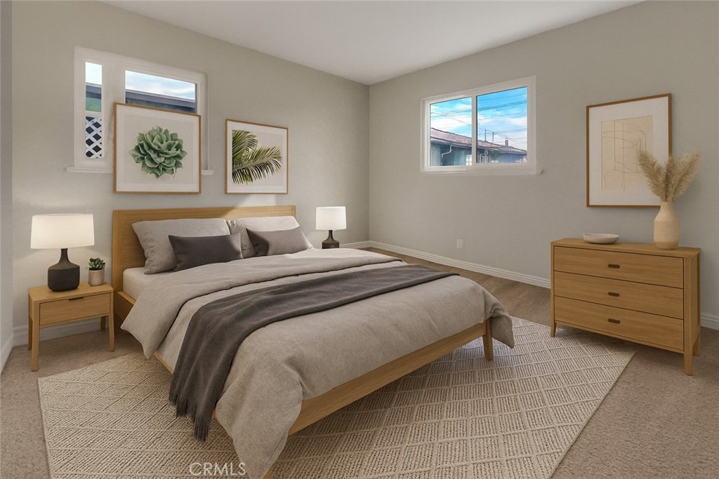 380 Harvard Street Oxnard, CA 93036 - Photo 9 of 14 a bedroom with a bed and a window