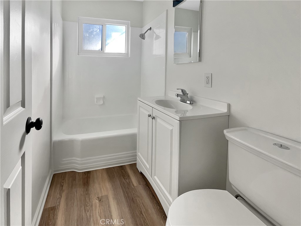 380 Harvard Street Oxnard, CA 93036 - Photo 10 of 14 a bathroom with a sink a toilet and shower