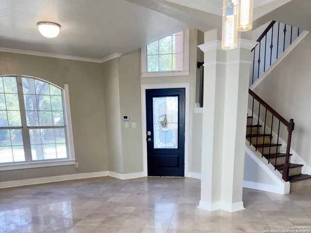 a view of an entryway with staircase