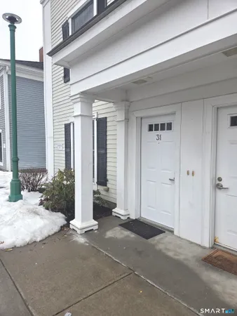 a view of a house with backyard porch