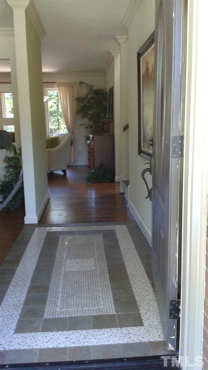 204 Sampson Street Raleigh, NC 27609 - Photo 2 of 22 a view of entryway with wooden floor