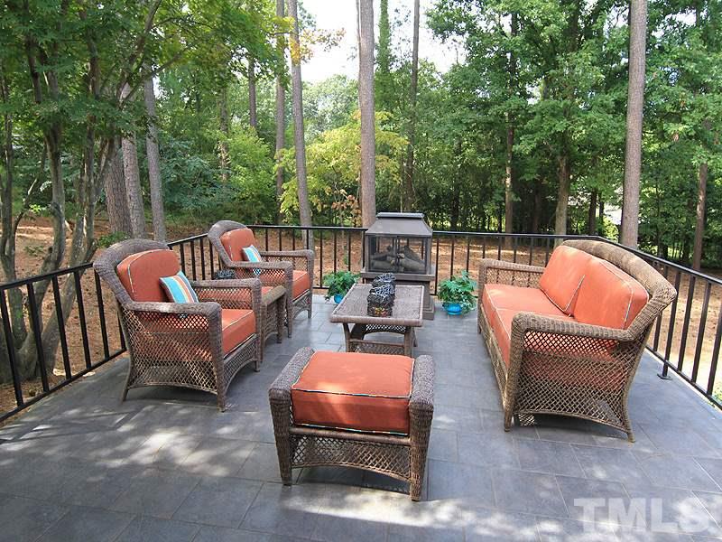 204 Sampson Street Raleigh, NC 27609 - Photo 17 of 22 a backyard of a house with outdoor seating