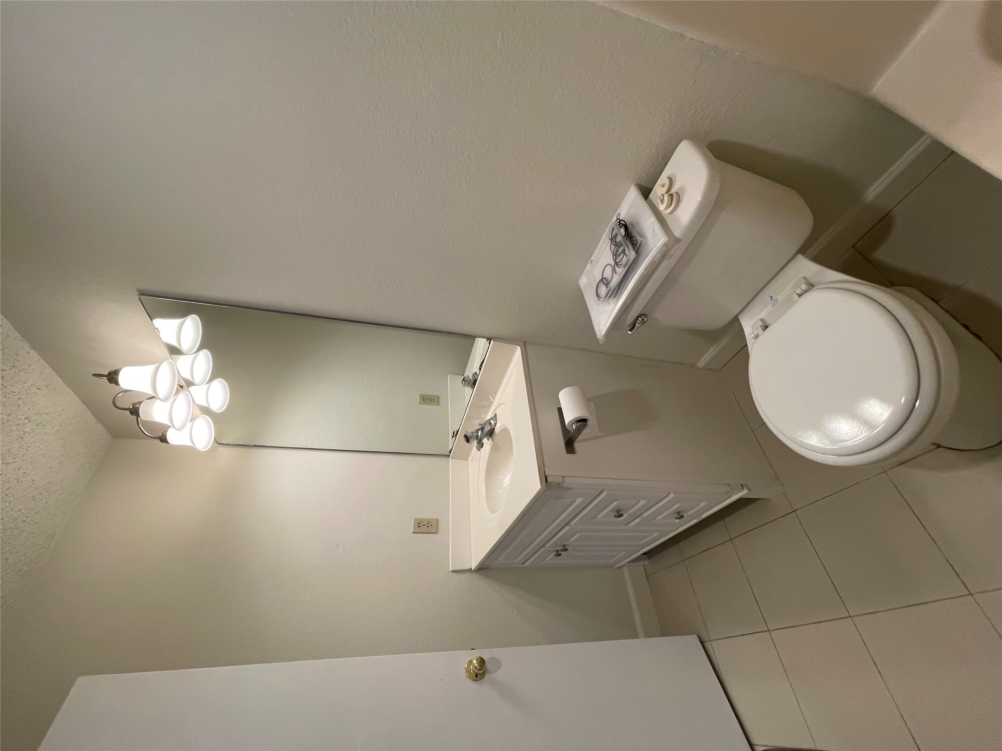 2031 Redwing Way Round Rock, TX 78664 - Photo 14 of 25 Functional primary bathroom with a simple vanity and essential fixtures.