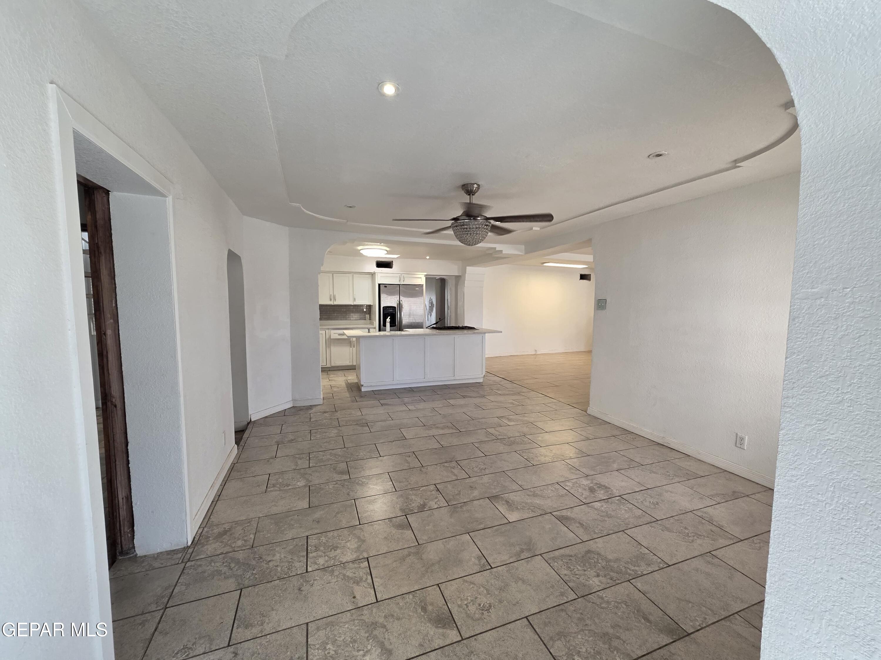 11661 Socorro Road Socorro, TX 79927 - Photo 27 of 32 a view of a big room with a kitchen