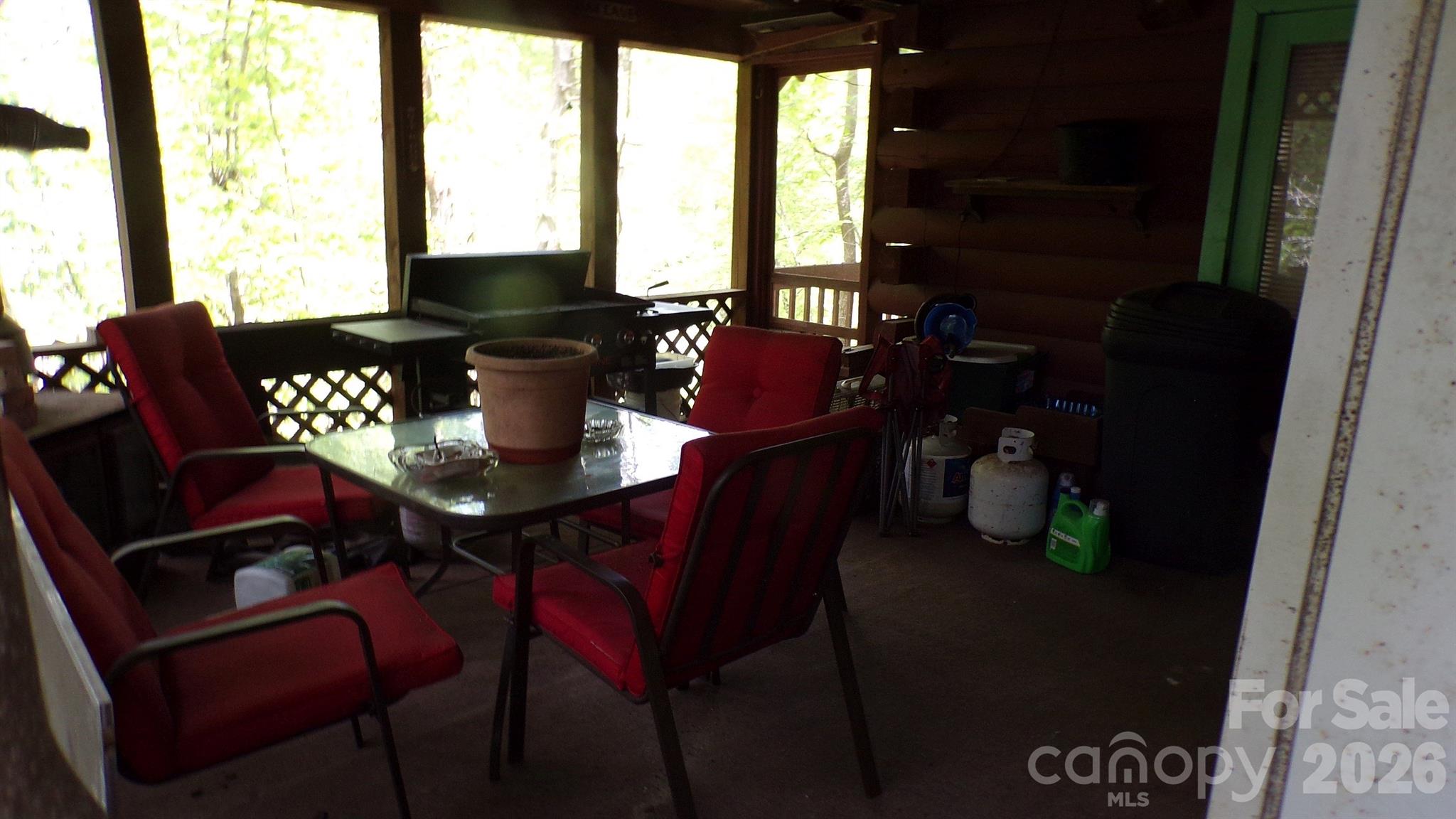 216 Paradise Road Hendersonville, NC 28792 - Photo 27 of 33 a view of a dining room with furniture window and outside view