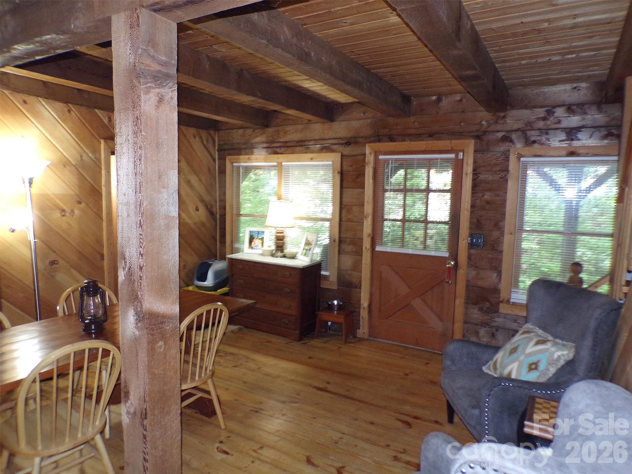 216 Paradise Road Hendersonville, NC 28792 - Photo 6 of 33 a living room with furniture and a window