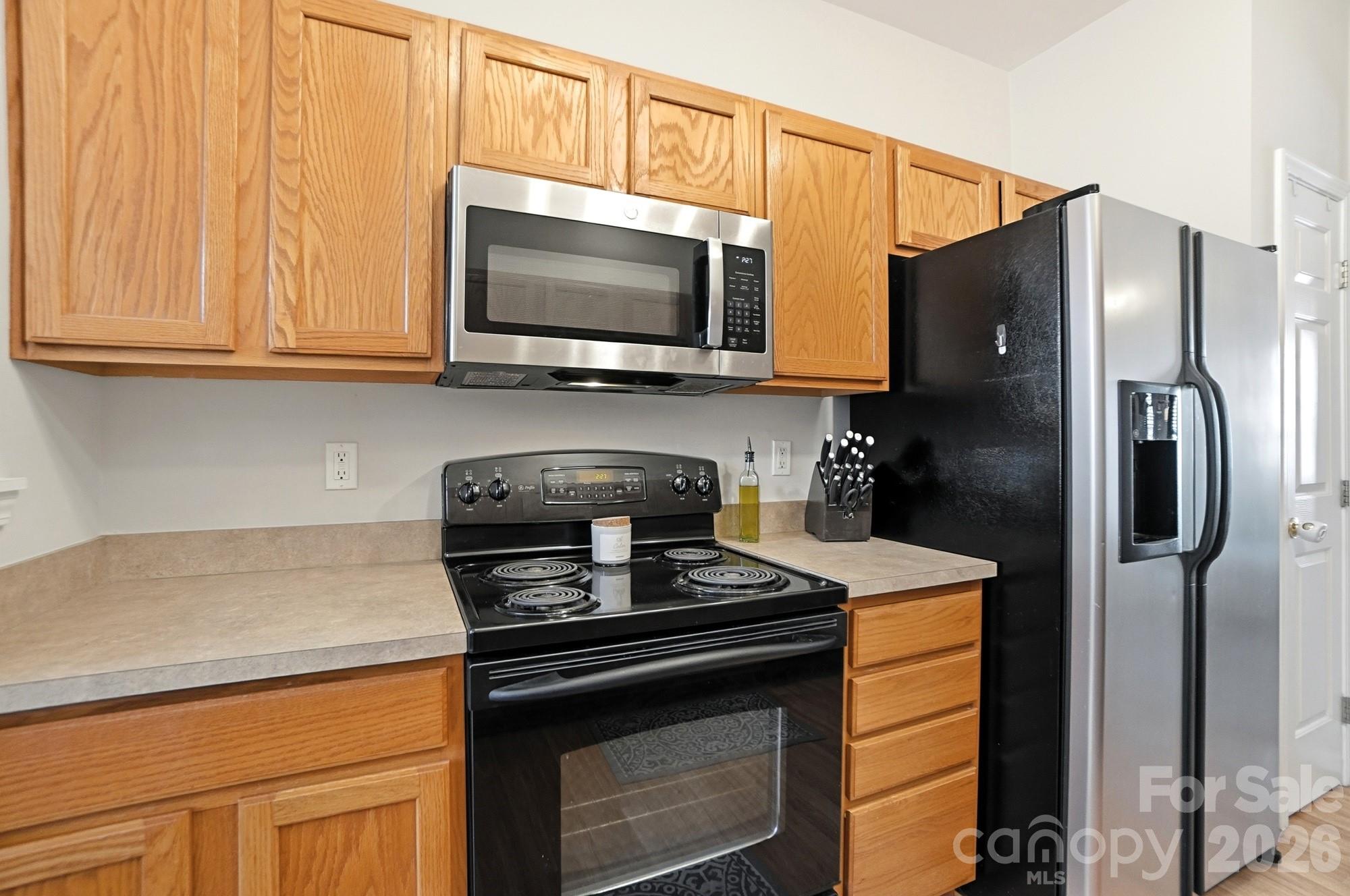 837 Dillard Road Rock Hill, SC 29730 - Photo 15 of 48 a kitchen with a stove microwave and refrigerator