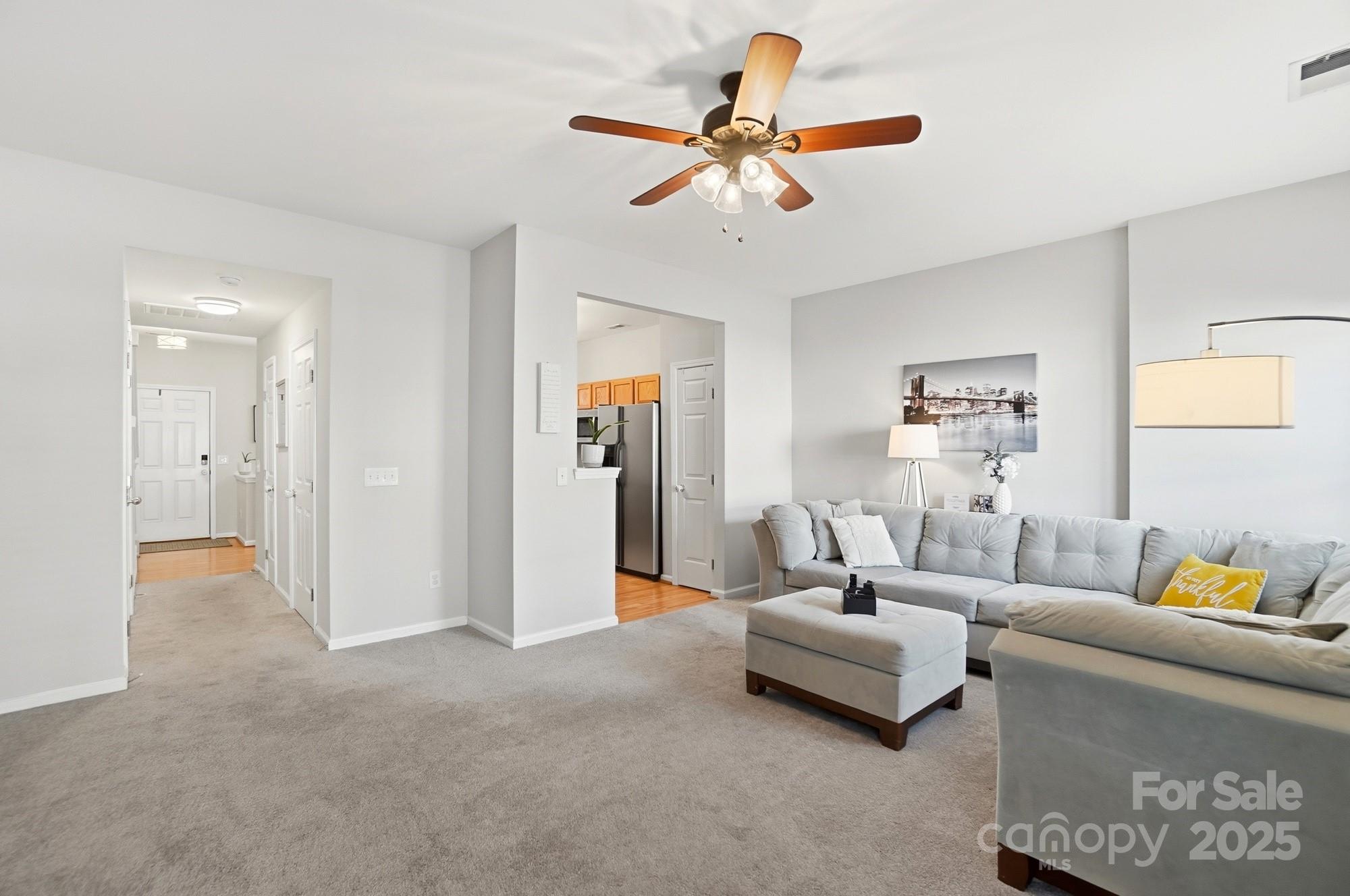 837 Dillard Road Rock Hill, SC 29730 - Photo 18 of 48 a living room with furniture and a ceiling fan