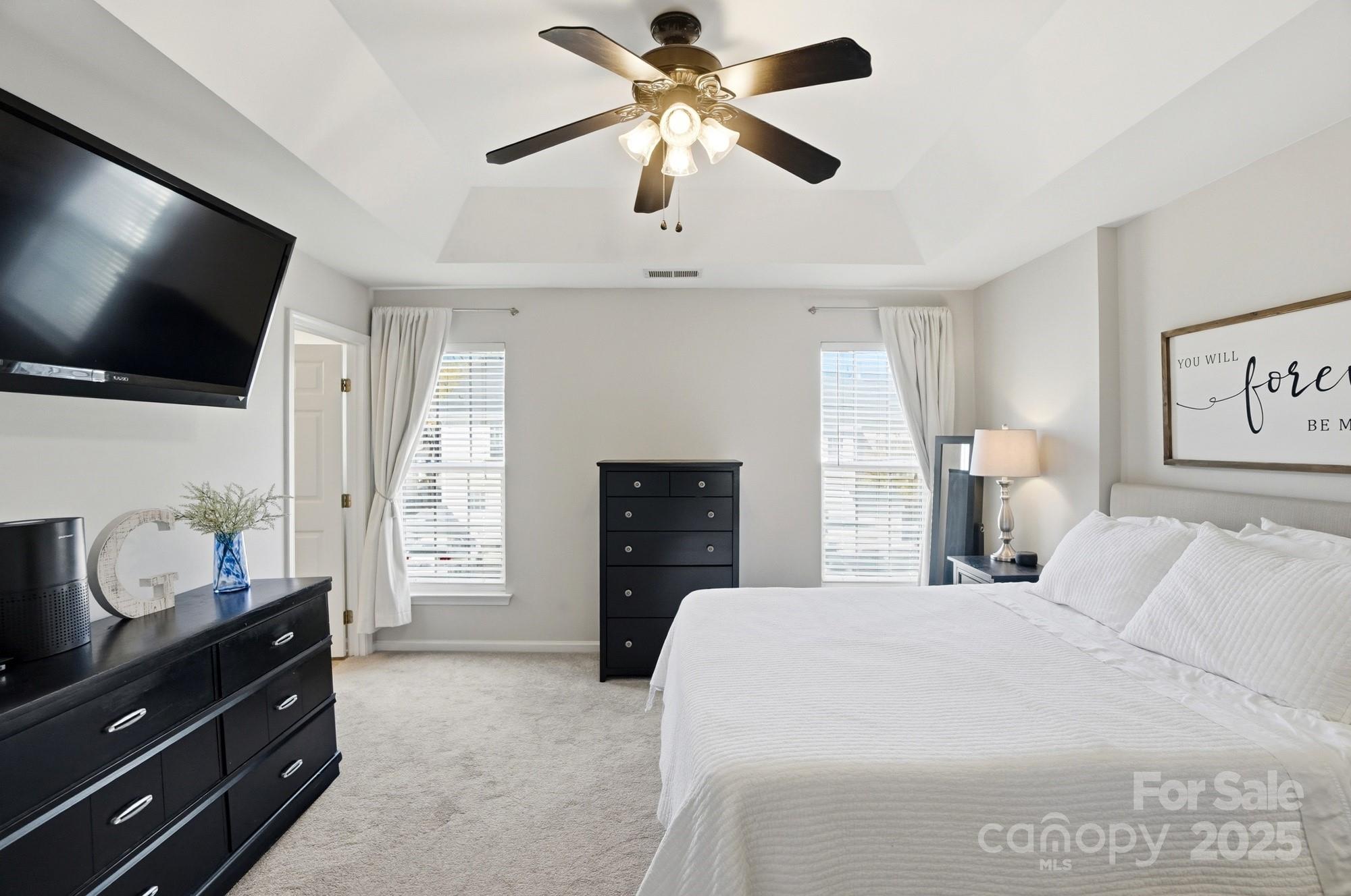 837 Dillard Road Rock Hill, SC 29730 - Photo 22 of 48 a bedroom with a bed and a flat screen tv