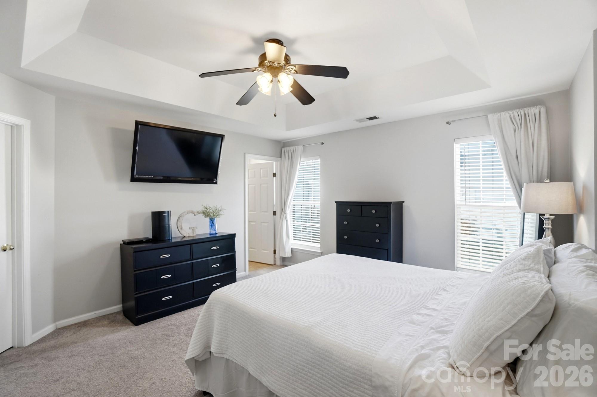 837 Dillard Road Rock Hill, SC 29730 - Photo 23 of 48 a bedroom with a bed and a flat screen tv