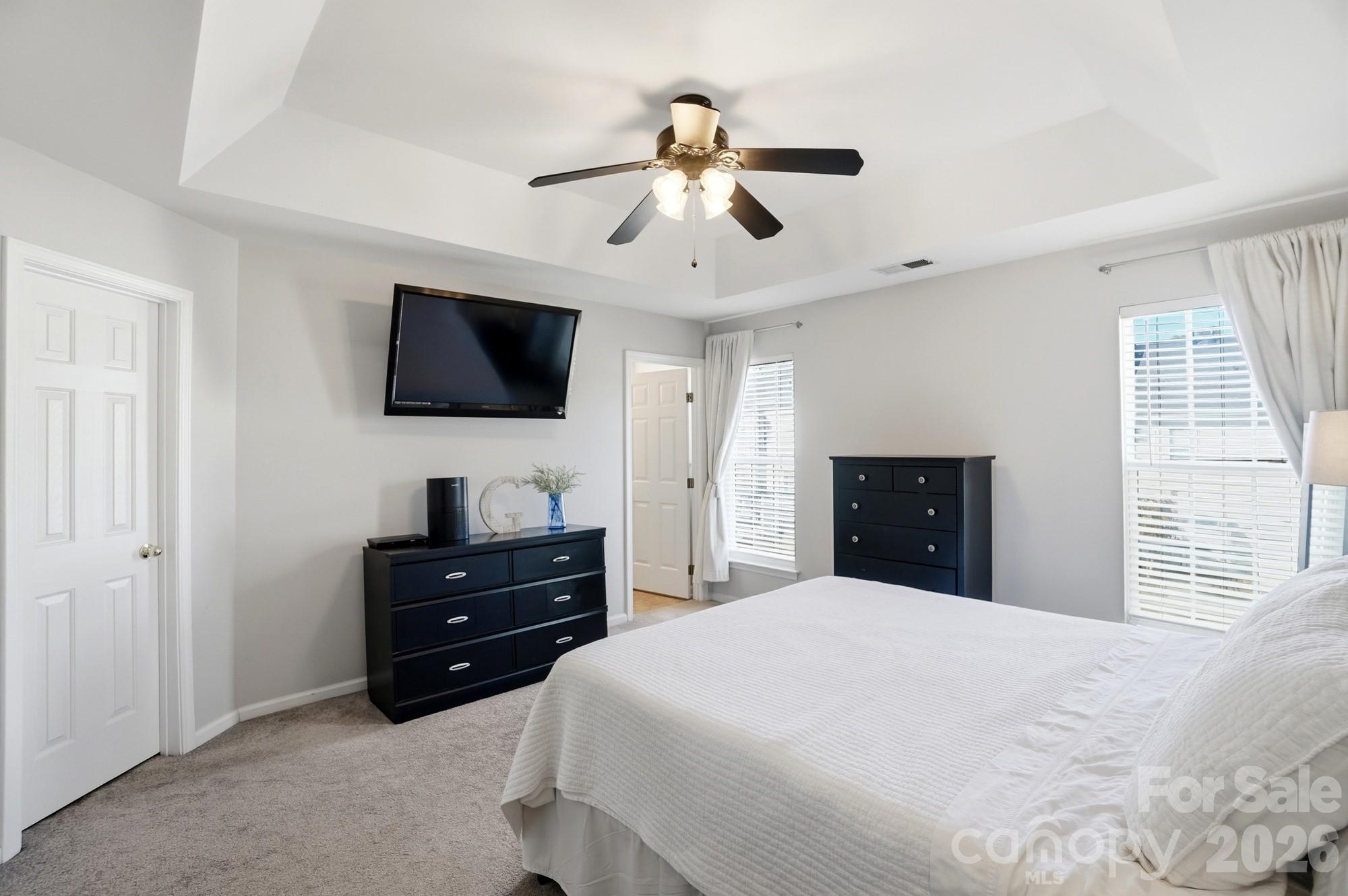837 Dillard Road Rock Hill, SC 29730 - Photo 24 of 48 a bedroom with a bed and a flat screen tv