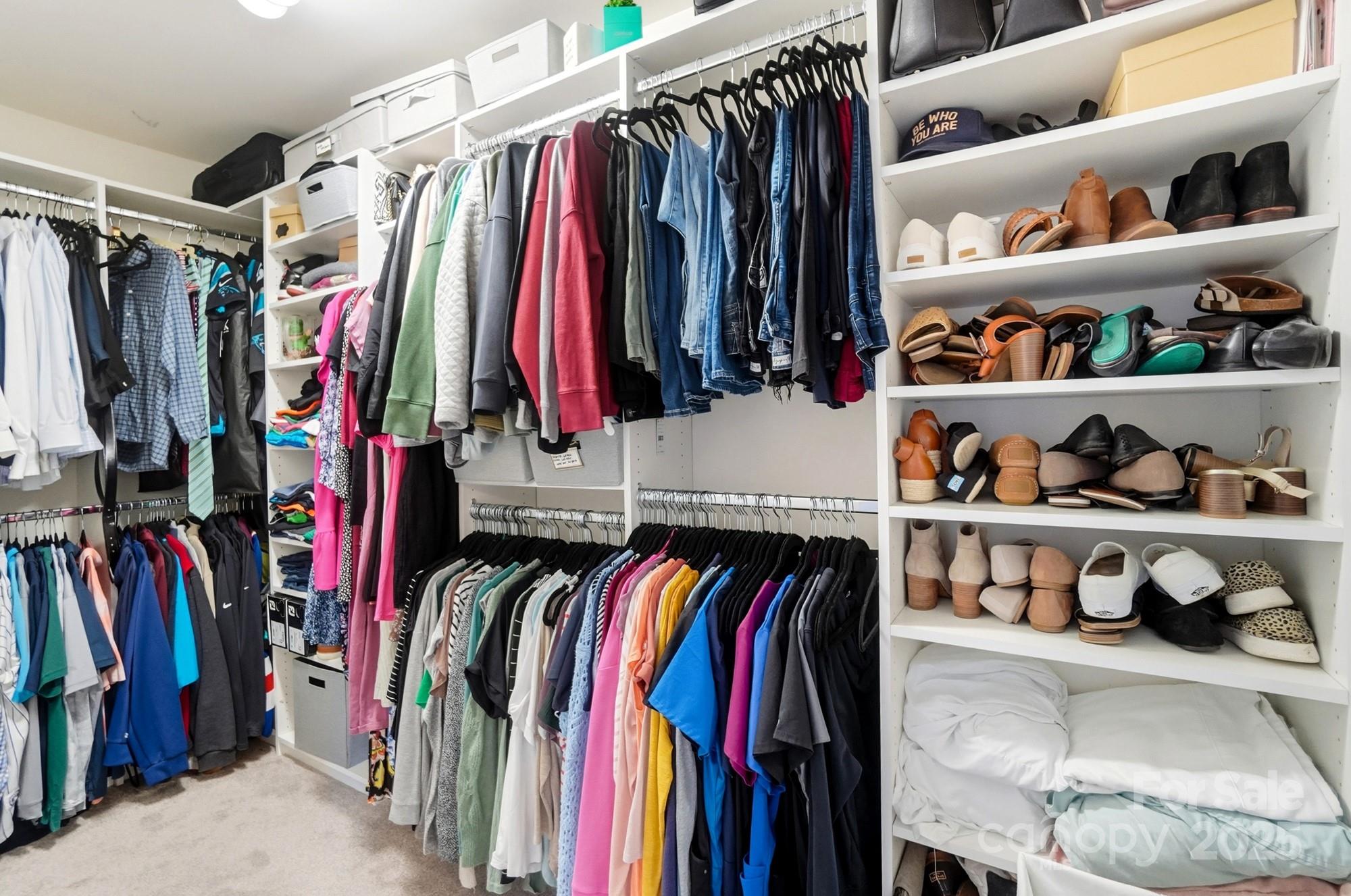 837 Dillard Road Rock Hill, SC 29730 - Photo 31 of 48 a view of walk in closet with clothes and shoes