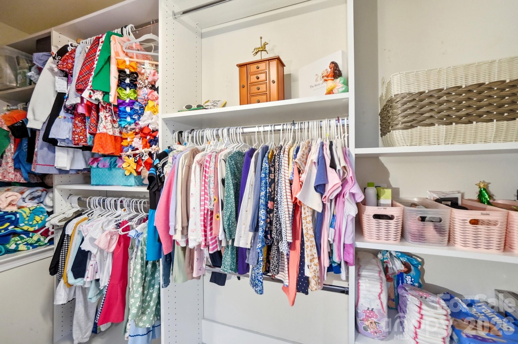 837 Dillard Road Rock Hill, SC 29730 - Photo 36 of 48 a view of walk in closet with clothes and shoes