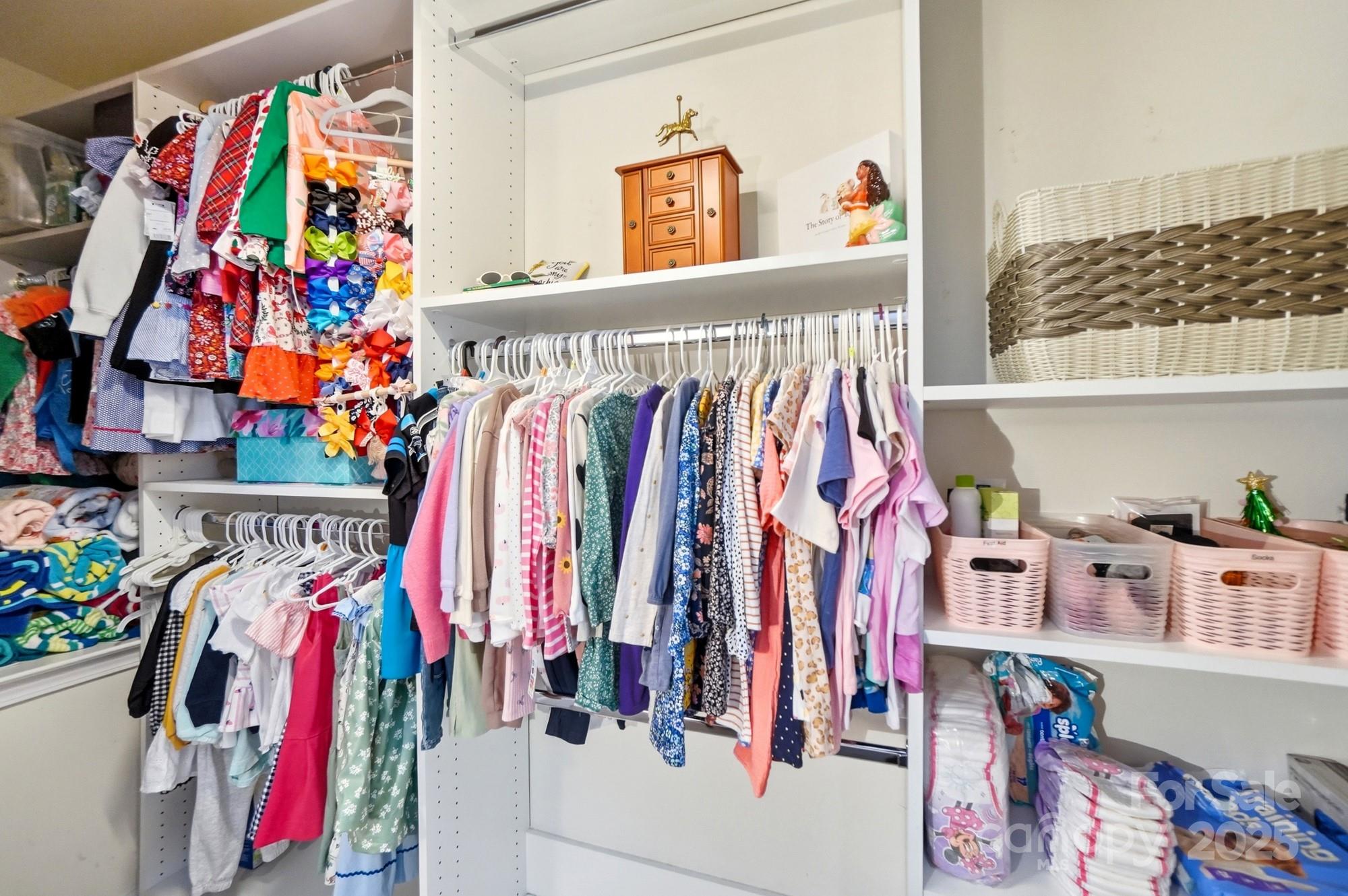 837 Dillard Road Rock Hill, SC 29730 - Photo 36 of 48 a view of walk in closet with clothes and shoes