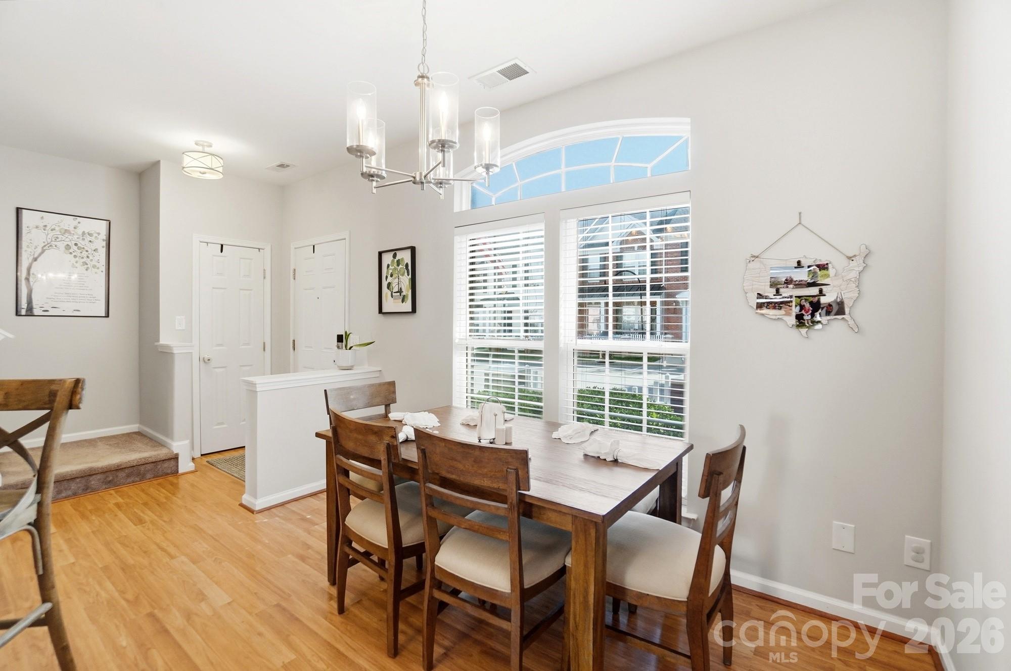 837 Dillard Road Rock Hill, SC 29730 - Photo 9 of 48 a view of a dining room with furniture window and wooden floor
