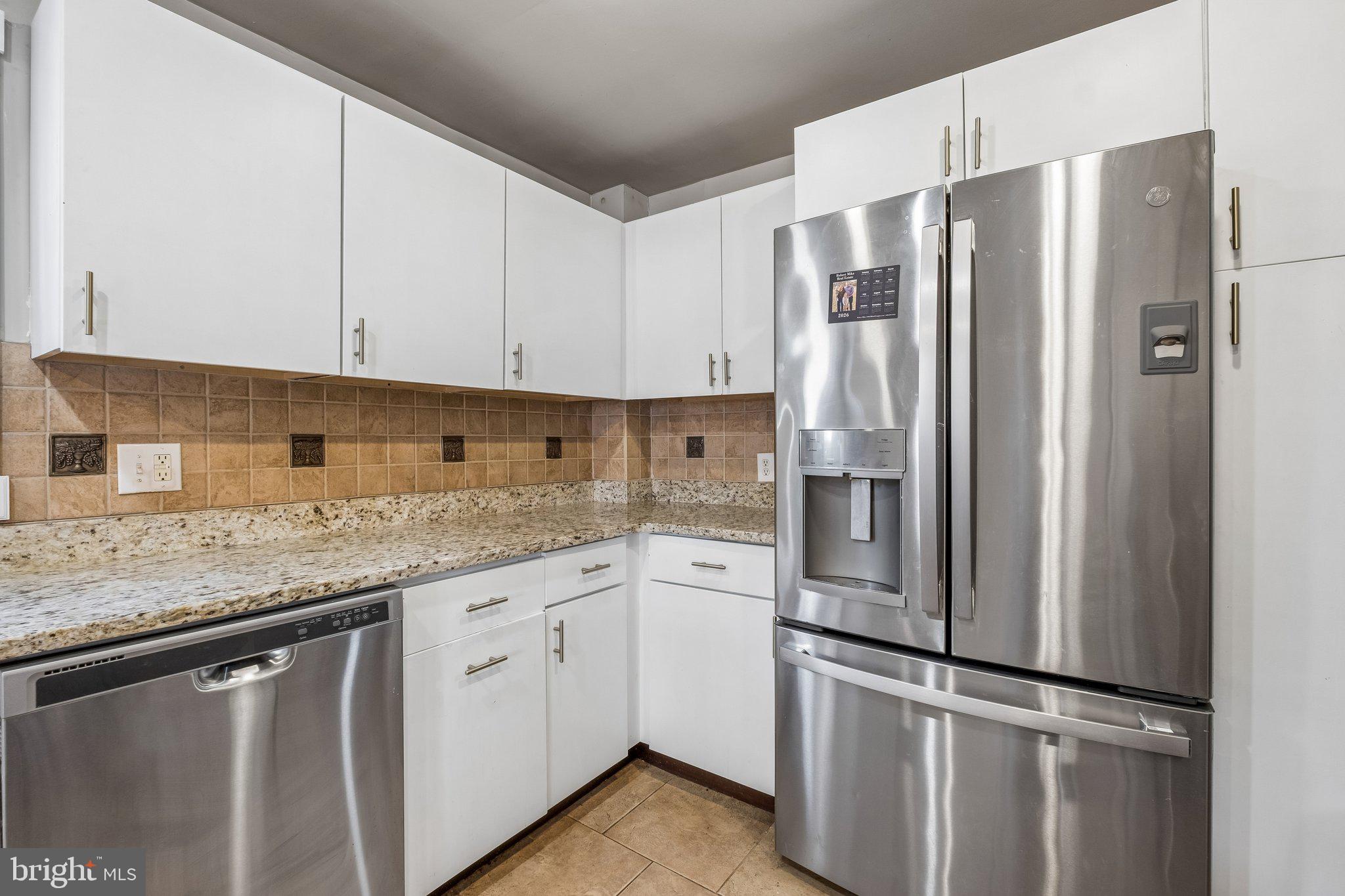 725 Hill Road Philadelphia, PA 19128 - Photo 14 of 43 a kitchen with stainless steel appliances granite countertop a refrigerator and a sink