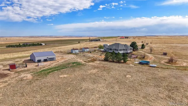 $925,000 | 57443 East Geddes Avenue, Strasburg, CO 80136