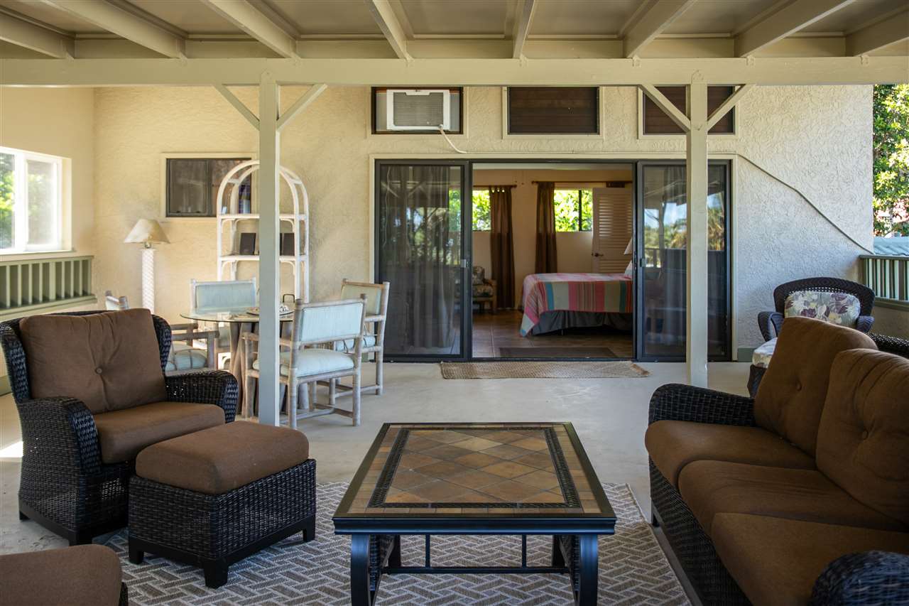 1555 West Kuiaha Road Haiku, HI 96708 - Photo 15 of 30 a living room with furniture and a window