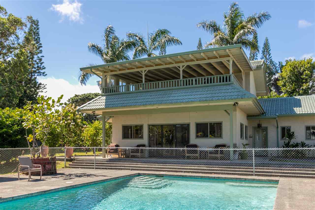 1555 West Kuiaha Road Haiku, HI 96708 - Photo 4 of 30 a front view of house with yard and outdoor seating