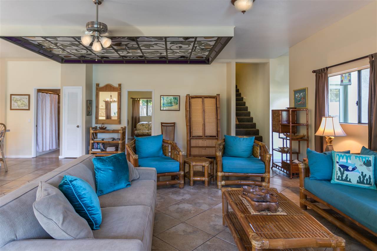 1555 West Kuiaha Road Haiku, HI 96708 - Photo 6 of 30 a living room with furniture and wooden floor
