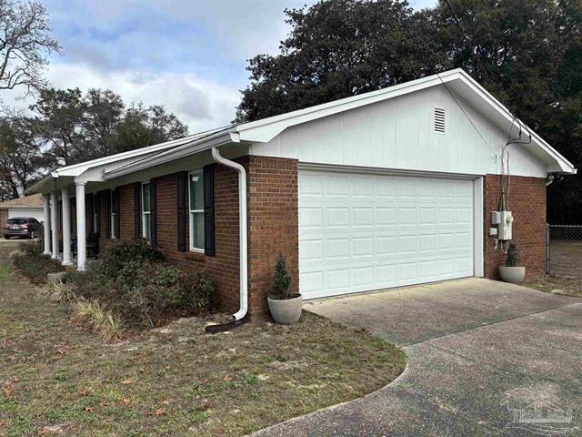 5367 Constitution Road Crestview, FL 32539 - Photo 3 of 25 a front view of a house with garage